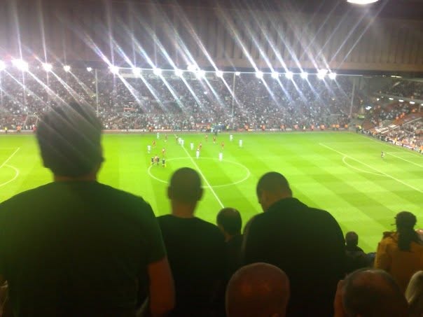 A floodlit football match at Anfield, from Malcolm’s Liverpool album